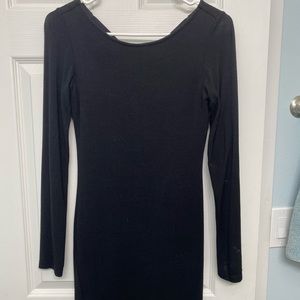 Black long sleeve open back body on dress